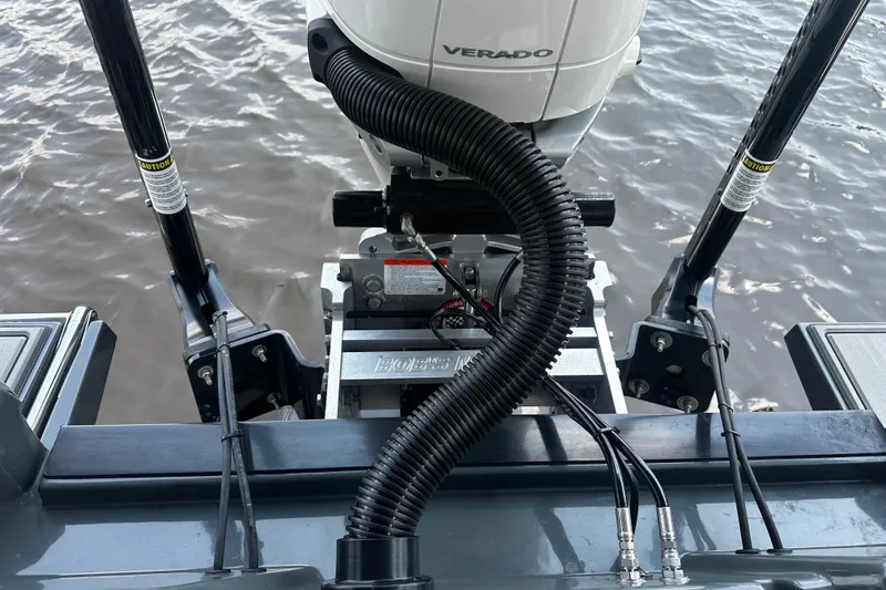 Slide: The Image of 2024 H-Craft 27 CC boat engine setup with Verado motor on water. - 16