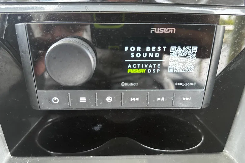Slide: The Image of 2024 H-Craft 27 CC audio system with Fusion DSP activation display and control panel. - 29