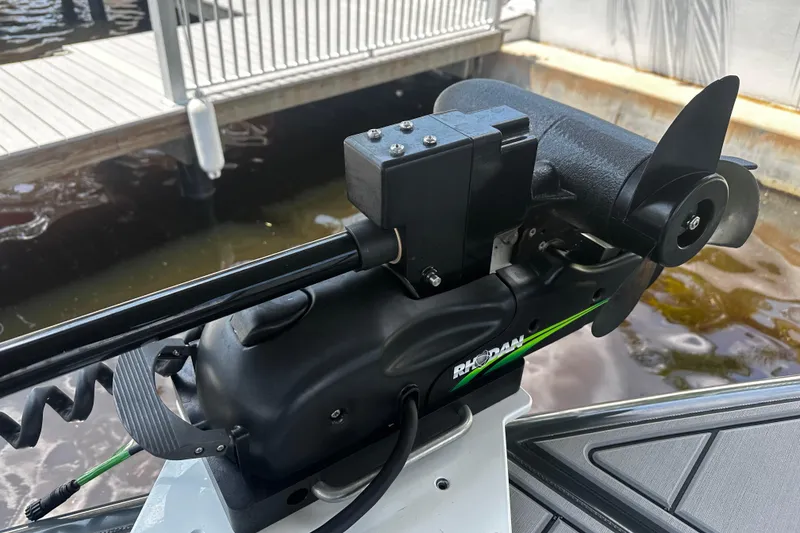 Slide: The Image of 2024 H-Craft 27 CC boat with Rhodan trolling motor at dockside. - 33