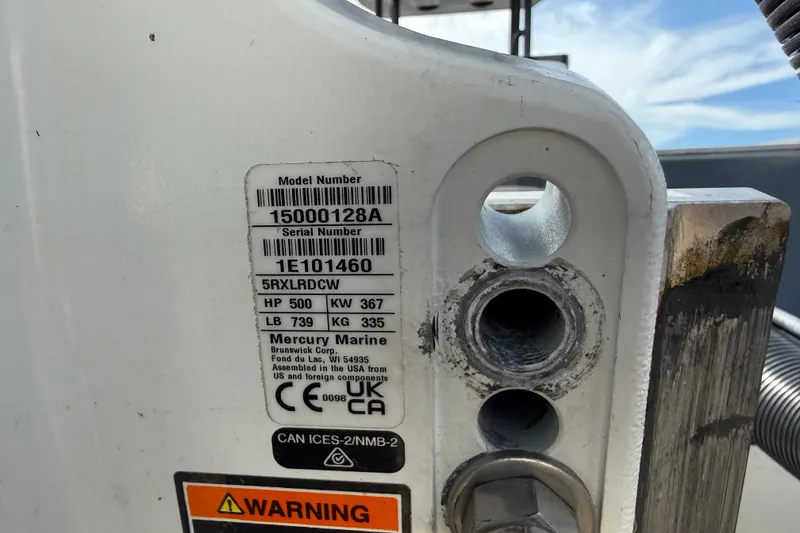 Slide: The Image of Label on H-Craft 27 CC 2024 model, displaying specifications and warning. - 48