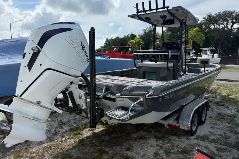 Slide: The Image of 2024 H-Craft 27 CC boat with powerful outboard engine on trailer. - 6