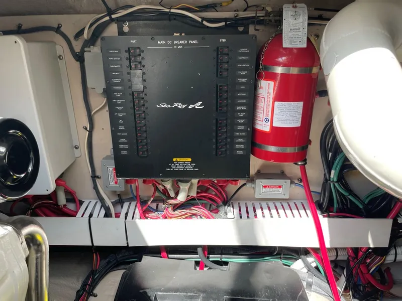 Slide: The Image of Electrical panel and fire extinguisher in 2006 Sea Ray 480 Sundancer boat. - 25