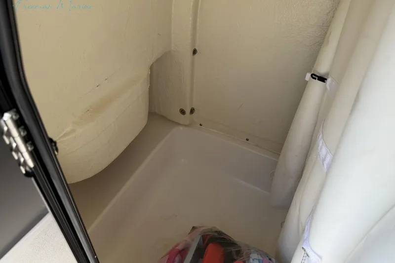 Slide: The Image of Interior storage compartment of 2020 Tidewater 232 CC Adventure boat. - 12