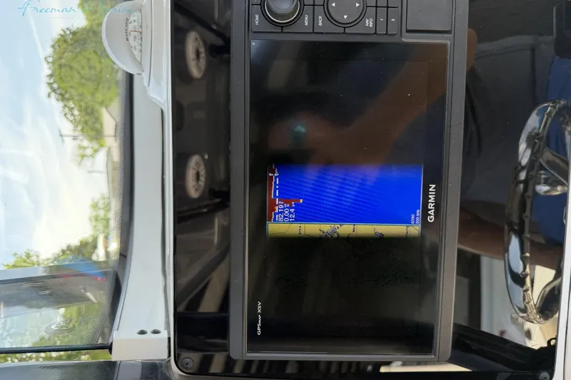 Slide: The Image of Garmin GPS display on 2020 Tidewater 232 CC Adventure boat dashboard. - 16
