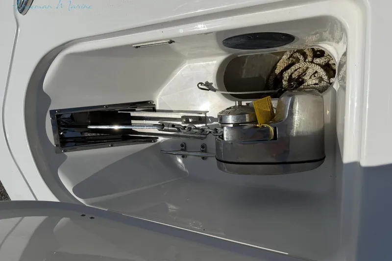 Slide: The Image of Anchor compartment of 2020 Tidewater 232 CC Adventure boat with chain and rope. - 5
