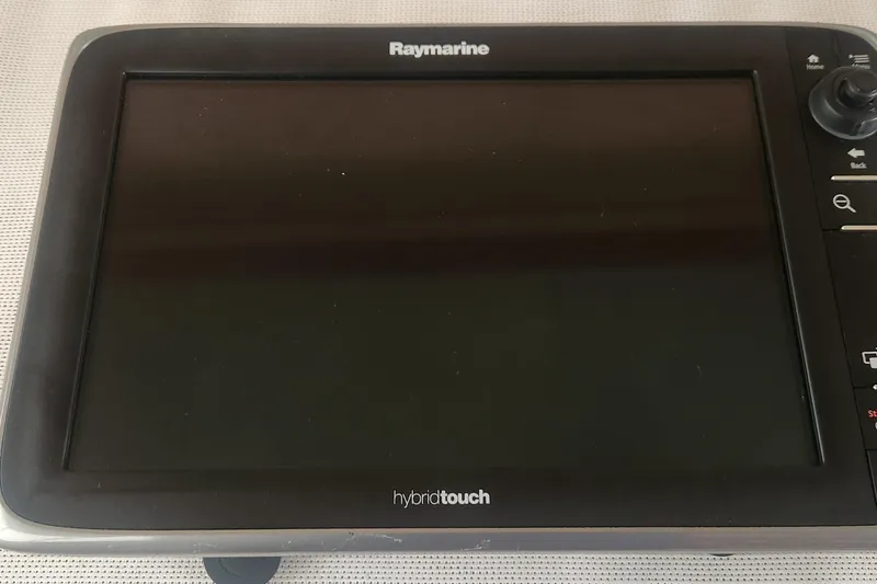 Slide: The Image of Raymarine HybridTouch display on 1985 Bertram 33 Flybridge Cruiser boat. - 25