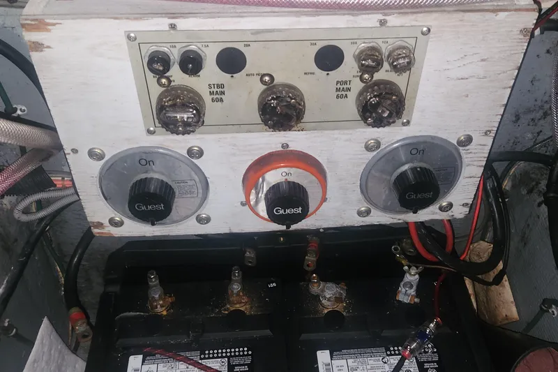 Slide: The Image of Electrical panel and battery setup on a 1985 Bertram 33 Flybridge Cruiser. - 31