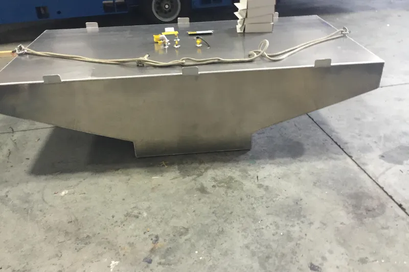 Slide: The Image of Aluminum fuel tank for 1985 Bertram 33 Flybridge Cruiser on workshop floor. - 32