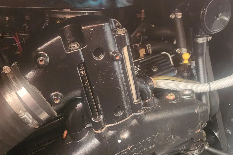 Slide: The Image of Engine compartment of a 1985 Bertram 33 Flybridge Cruiser, showcasing mechanical components. - 40