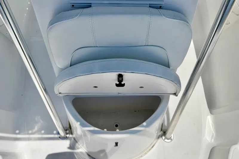 Slide: The Image of 2009 Sea Fox 216 Center Console boat seat with storage compartment. - 10