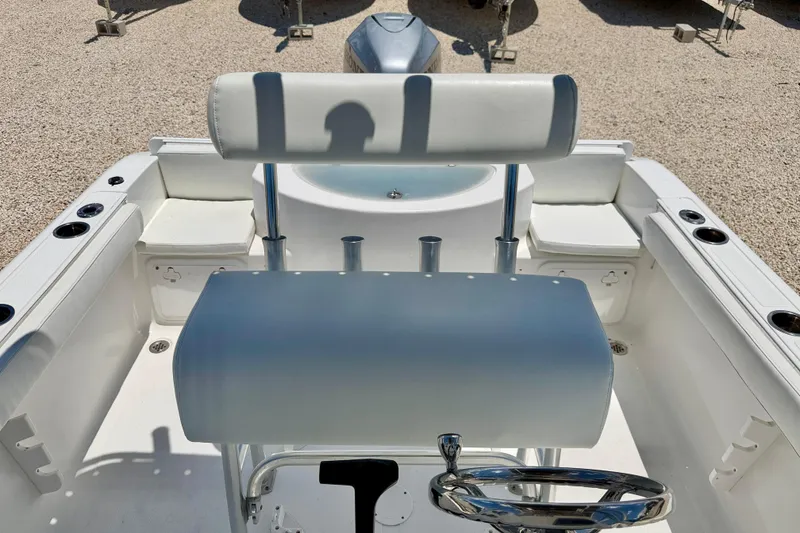 Slide: The Image of 2009 Sea Fox 216 Center Console boat interior with seating and steering wheel. - 15
