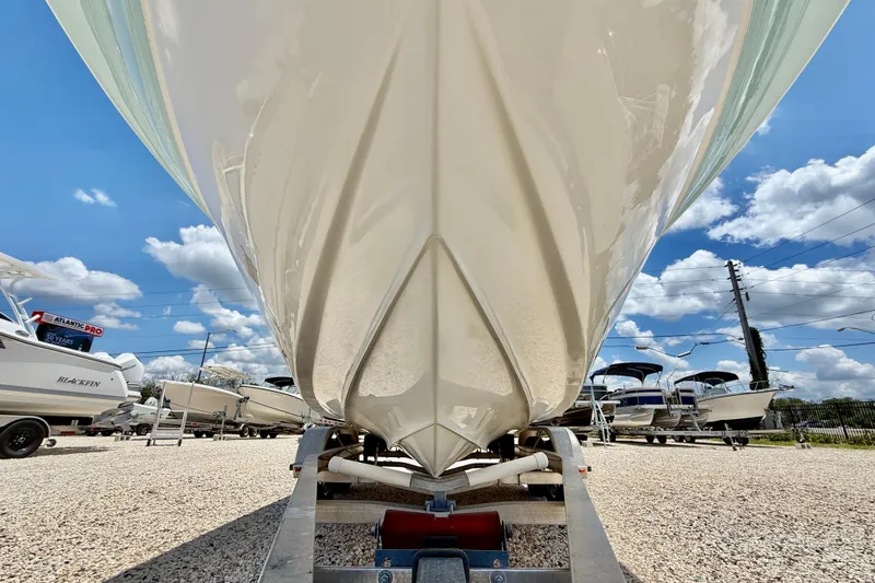 Slide: The Image of 2009 Sea Fox 216 Center Console boat on trailer under blue sky. - 32