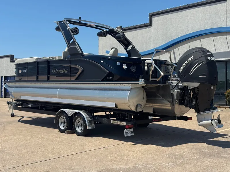 Slide: The Image of 2024 Manitou 25 LX RFX SHP pontoon boat with Mercury 400 engine. - 3