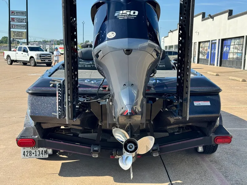 Slide: The Image of Rear view of a 2018 Skeeter FX21 boat with Yamaha 250 engine. - 4