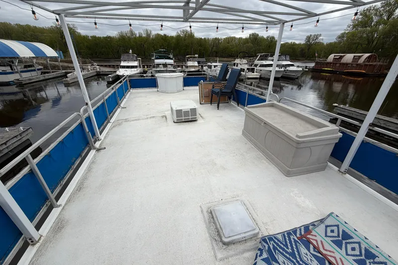 Slide: The Image of Rooftop deck of 1997 Catamaran Cruisers 44' Aqua Cruiser with seating and storage. - 15