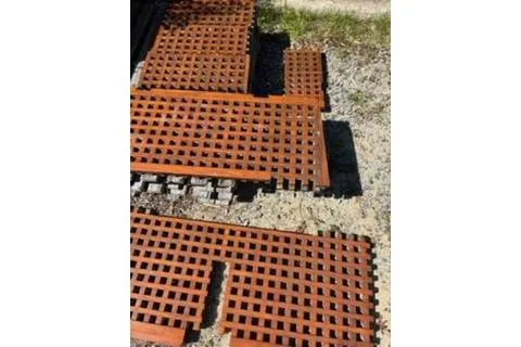 Slide: The Image of Wooden lattice panels on ground, possibly for a 1974 Marshall 22 Catboat restoration. - 26
