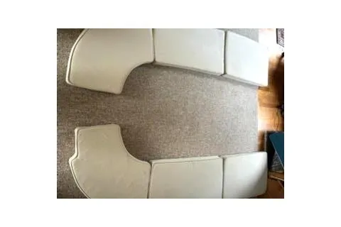 Slide: The Image of Cushions for a 1974 Marshall 22 Catboat, arranged on a carpeted floor. - 28