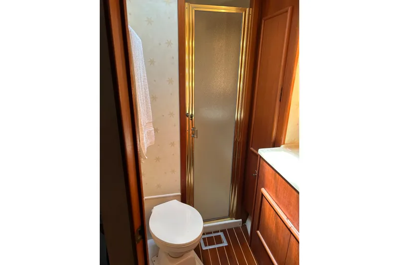 Slide: The Image of Bathroom interior of 1990 Post 46 Convertible yacht with shower and toilet. - 13