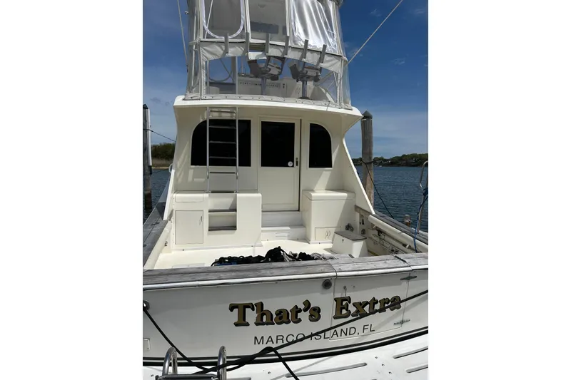 Slide: The Image of 1990 Post 46 Convertible boat docked, named "That's Extra," Marco Island, FL. - 24