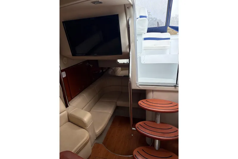 Slide: The Image of Interior of 2013 Formula 34 Performance Cruiser with leather seating and mounted TV. - 10
