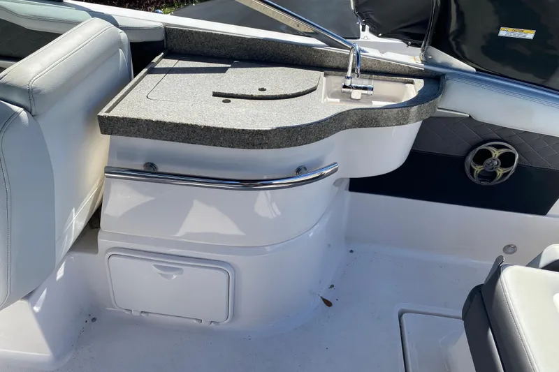 Slide: The Image of Interior of 2013 Regal 27 FasDeck RX boat with sink and countertop. - 13