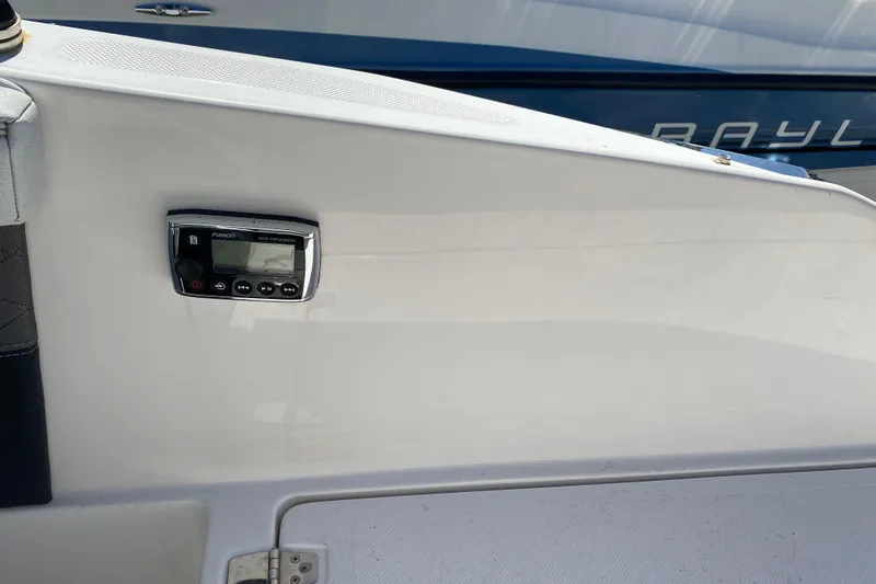 Slide: The Image of 2013 Regal 27 FasDeck RX boat interior with Fusion stereo system. - 20