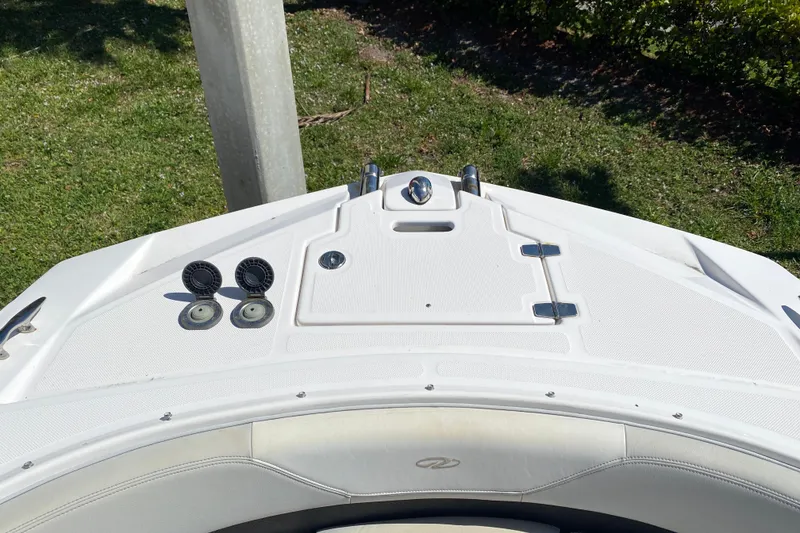 Slide: The Image of Bow of 2013 Regal 27 FasDeck RX boat with white deck and fittings. - 9