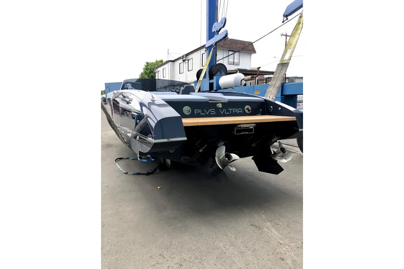 Slide: The Image of 2020 Frauscher 1017 GT luxury boat on a dock, showcasing sleek design and dual propellers. - 9