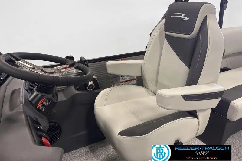 Slide: The Image of 2026 Bennington 20 SSR boat interior with steering wheel and captain's chair. - 3