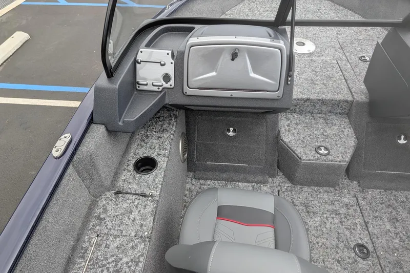 Slide: The Image of 2026 Tracker Pro Guide V-175 WT boat interior with gray seating and storage compartments. - 10