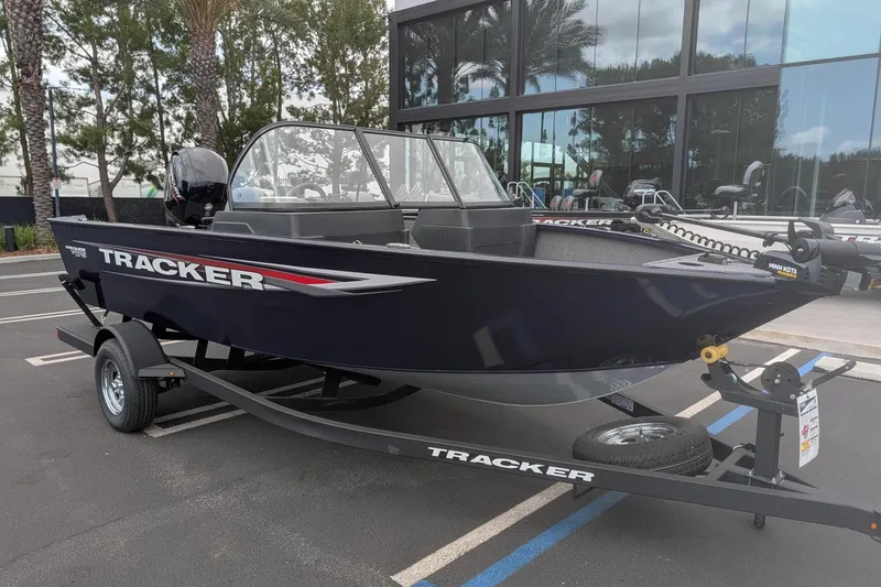 The Image of 2026 Tracker Pro Guide V-175 WT boat on trailer, parked outdoors. - 0