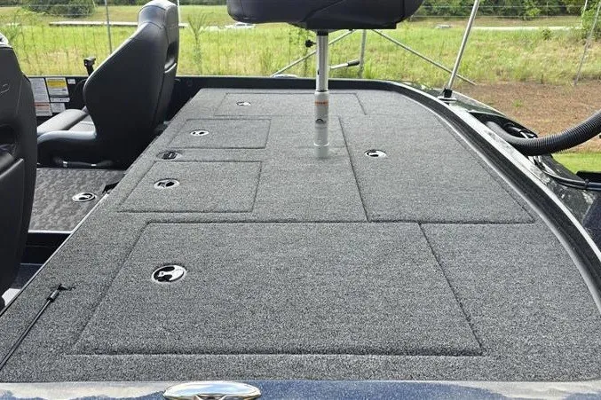 Slide: The Image of 2026 Nitro Z21 XL boat deck with storage compartments and seating. - 13