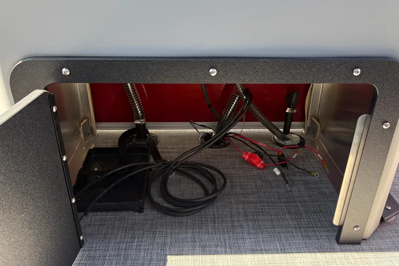 Slide: The Image of Interior wiring of 2026 Sun Tracker SportFish 20 DLX boat, showcasing cables and components. - 29