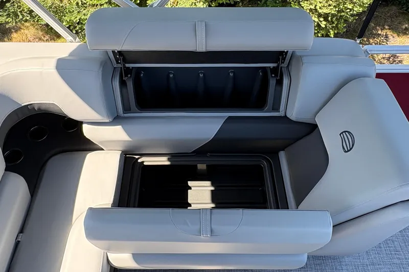 Slide: The Image of Sun Tracker SportFish 20 DLX 2026 boat seating with storage compartments open. - 37
