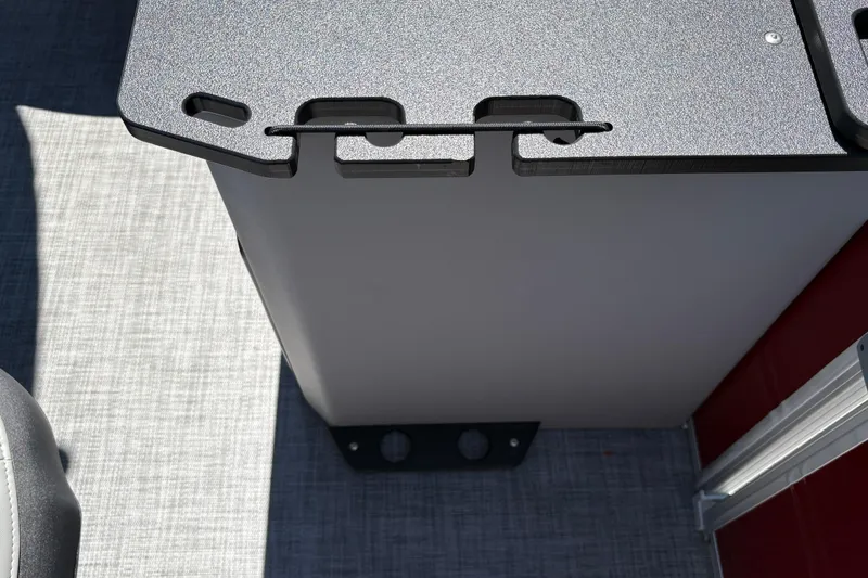 Slide: The Image of 2026 Sun Tracker SportFish 20 DLX boat interior detail with textured surface and modern design. - 22
