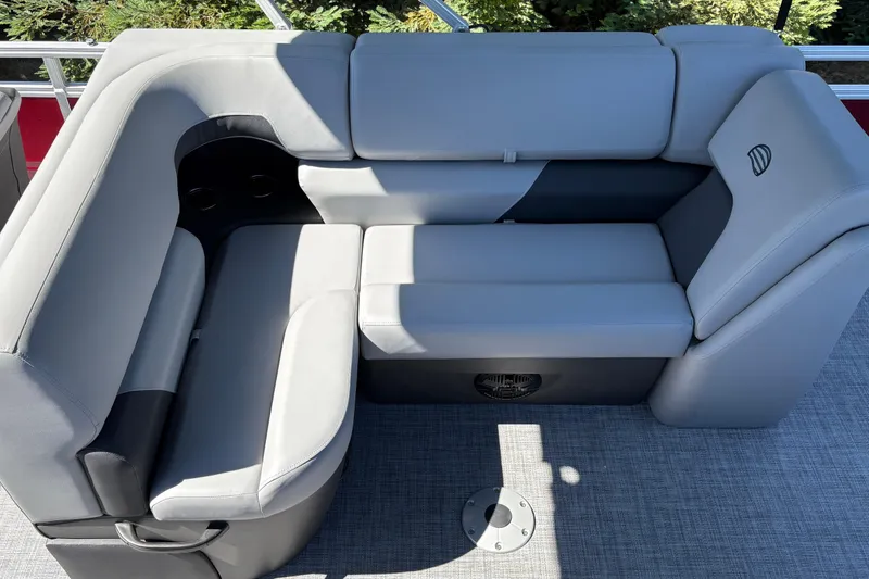 Slide: The Image of Luxurious seating on 2026 Sun Tracker SportFish 20 DLX pontoon boat, featuring sleek gray upholstery. - 36