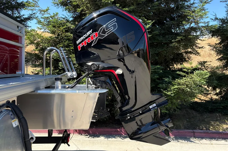 Slide: The Image of Mercury Pro XS 115 outboard motor on 2026 Sun Tracker SportFish 20 DLX boat. - 11