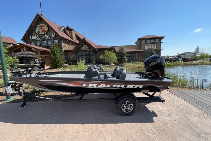 The Image of 2026 Tracker Pro Team 190 boat displayed outside Bass Pro Shops Outdoor World. - 0