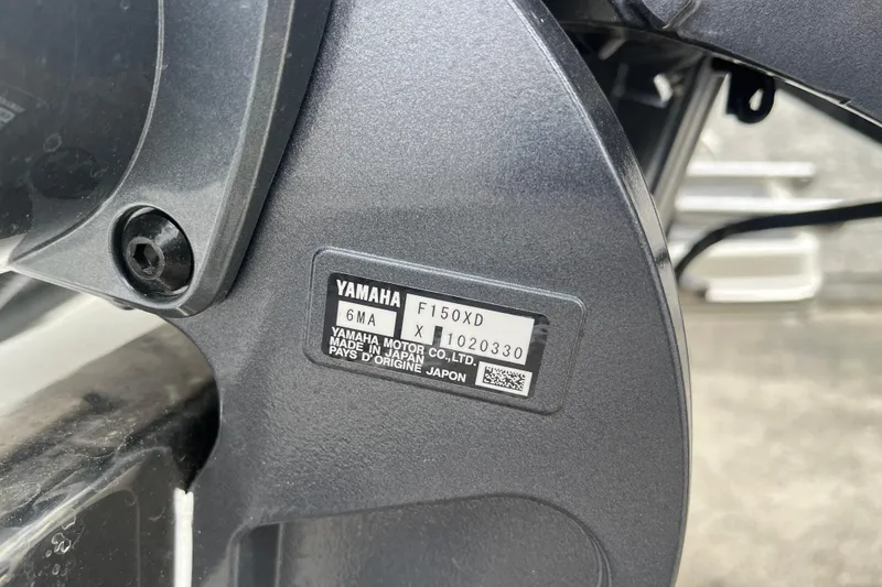 Slide: The Image of Close-up of Yamaha F150XD engine label on 2026 Pioneer 202 Islander boat. - 15