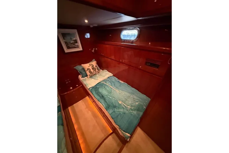 Slide: The Image of Luxurious cabin interior of 2008 Hampton 60' Aft Cabin Motor Yacht with elegant bedding. - 32