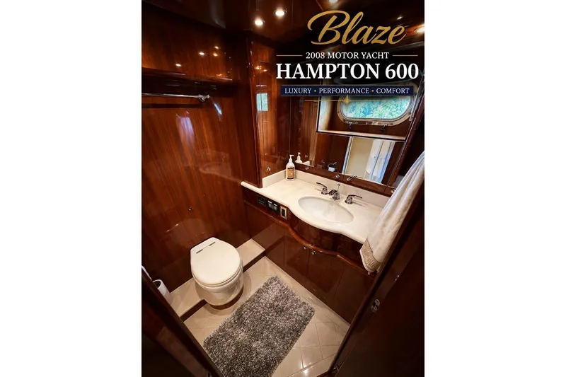 Slide: The Image of Luxurious bathroom in 2008 Hampton 60' Aft Cabin Motor Yacht, featuring elegant wood finishes. - 24