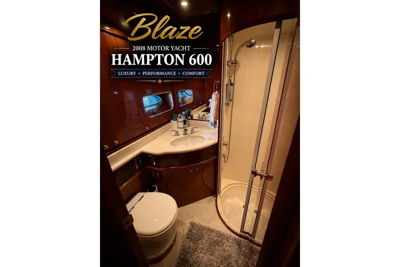 Slide: The Image of Luxurious bathroom in 2008 Hampton 60' Aft Cabin Motor Yacht, featuring elegant wood finishes. - 25