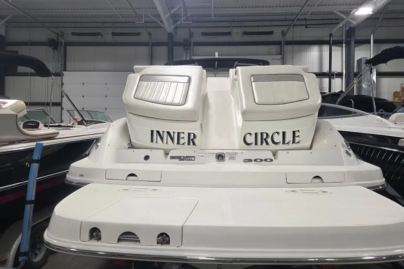 Slide: The Image of 2008 Sea Ray 300 Select EX boat in storage, labeled "Inner Circle." - 10