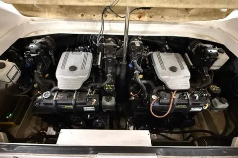 Slide: The Image of 2008 Sea Ray 300 Select EX engine compartment with dual engines. - 14