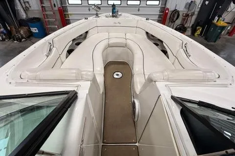 Slide: The Image of 2008 Sea Ray 300 Select EX boat interior with spacious seating and sleek design. - 7