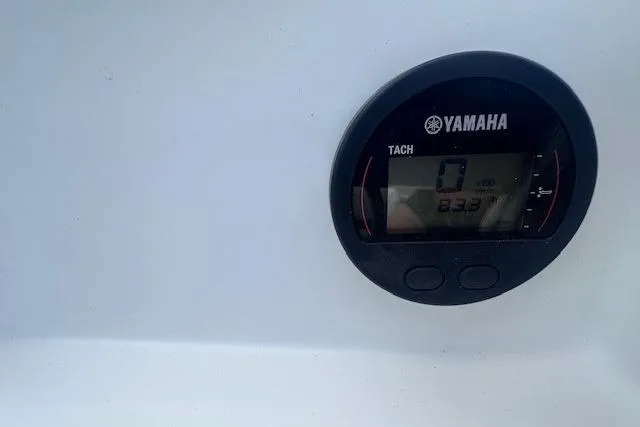 Slide: The Image of Yamaha tachometer on 2015 Novurania DL 460 boat dashboard. - 4