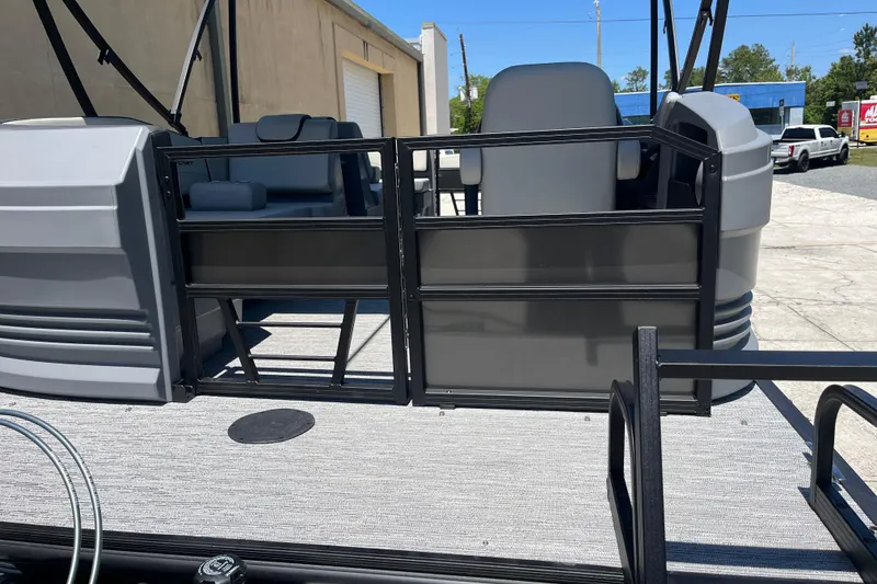 Slide: The Image of 2026 Starcraft GX 18 R pontoon boat with sleek gray seating and modern design. - 10