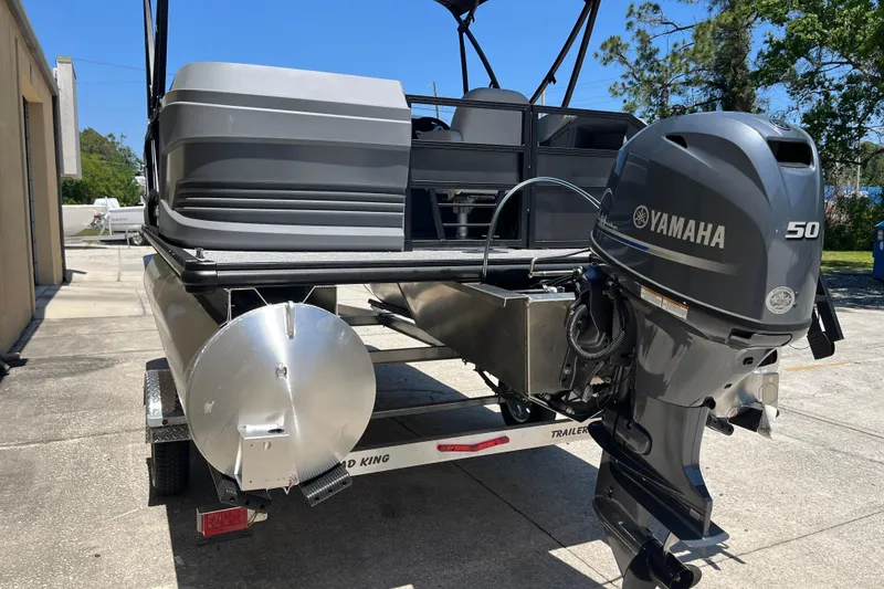 Slide: The Image of 2026 Starcraft GX 18 R pontoon boat with Yamaha 50 outboard motor on trailer. - 12