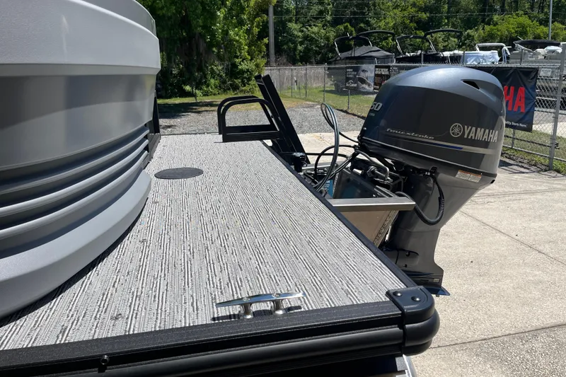Slide: The Image of 2026 Starcraft GX 18 R boat with Yamaha outboard motor in a sunny outdoor setting. - 14