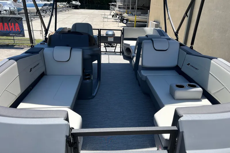 Slide: The Image of 2026 Starcraft GX 18 R boat interior with modern seating and cup holders. - 17